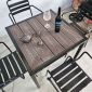 Combo bàn ngoài trời gỗ nhựa và 4 ghế sắt CBNT008